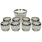 as seen on MADMEN...  Silver rimmed Dorothy Thorpes Roly Polys 8
